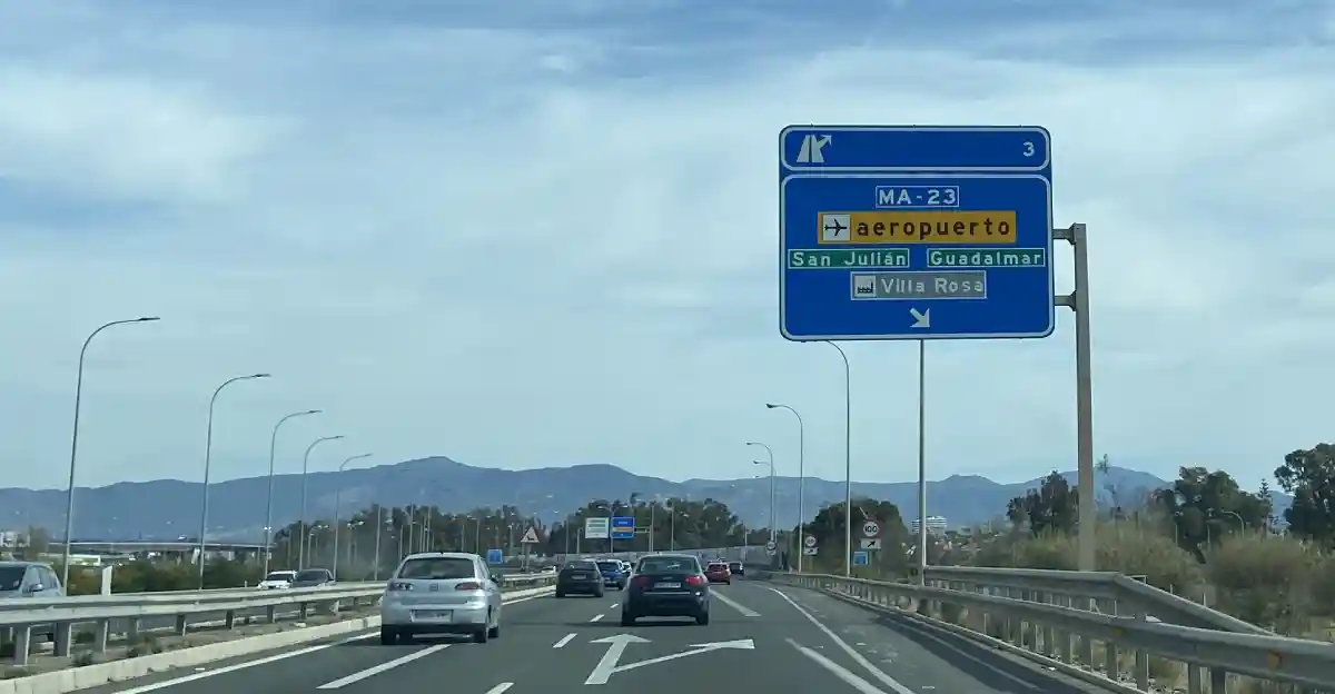 Highway sign showing directions to Málaga Airport (aeropuerto) on the MA-23 motorway